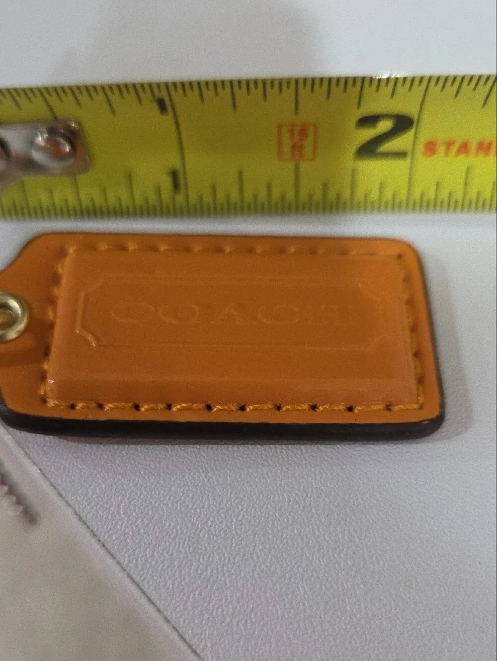 Coach leather tag